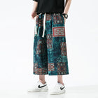 Pantaloncini da uomo estivi Stampa Pantaloni da spiaggia traspiranti a gamba larga Pantaloni larghi casual alla moda Vita elastica Comodi pantaloni al polpaccio da uomo