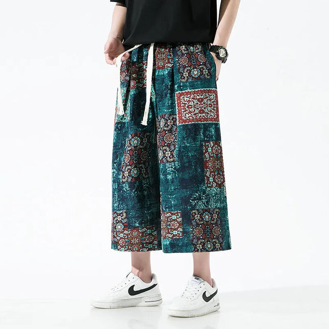 Pantaloncini da uomo estivi Stampa Pantaloni da spiaggia traspiranti a gamba larga Pantaloni larghi casual alla moda Vita elastica Comodi pantaloni al polpaccio da uomo