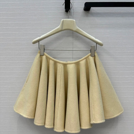 A light yellow high-waisted short skirt with ruffled edges and a double-sided wool A-line skirt, looking cute and playful PlatiNum