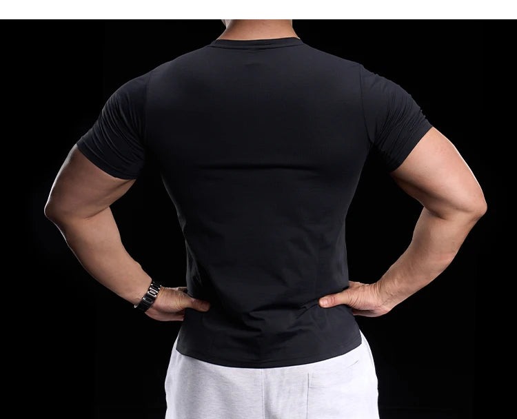Abbigliamento da allenamento fitness da palestra da uomo T-shirt sportiva attillata a maniche corte