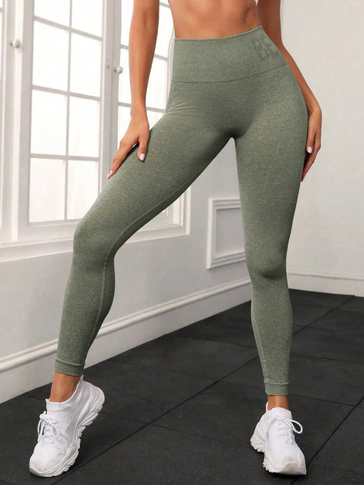 Seamless letter peach yoga pants, hip lifting yoga clothes, tight fitting high waisted sports and fitness pants for women PlatiNum