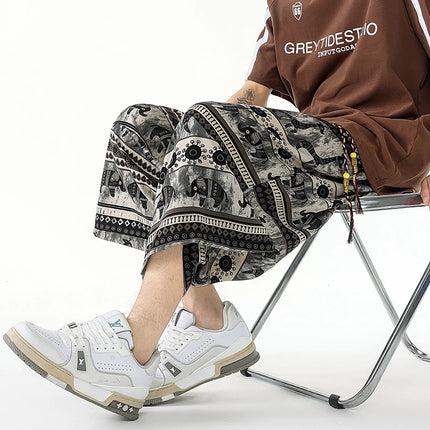 Pantaloncini estivi con stampa da spiaggia, pantaloni casual leggeri e traspiranti, pantaloni larghi alla moda da uomo, pantaloni comodi a lunghezza polpaccio per uomo