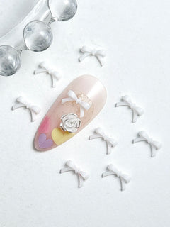50Pcs Multiple Colors Bowknots Nail Art Charms Mini Adorable Line Bows Ties Resin Nail Decorations for DIY Earring Nail Supplies