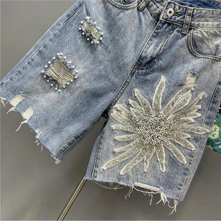 Pantaloncini di jeans con foro sfilacciato floreale con perline alla moda Pantaloncini casual estivi da donna a vita alta in tinta unita stile coreano