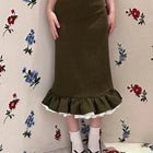 A new autumn/winter 2025 elegant and stylish body-hugging skirt with multi-layered ruffled edges and flower buds for women PlatiNum