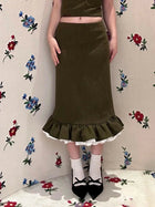 A new autumn/winter 2025 elegant and stylish body-hugging skirt with multi-layered ruffled edges and flower buds for women PlatiNum
