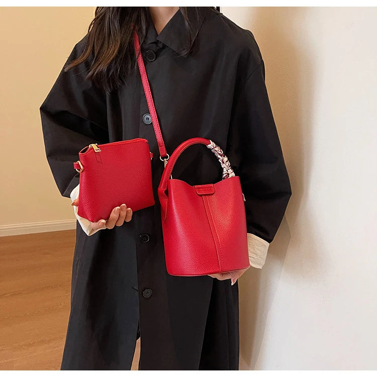 Borse a tracolla e a tracolla a secchiello in PU rosso Nero Senso del lusso Borsa a due usi da donna 2024 Moda versatile in vendita