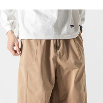 Pantaloni estivi da uomo a gamba larga Pantaloni moda casual solidi leggeri e sottili Harun Pantaloni da jogging larghi da uomo Pantaloni cargo Streetwear Taglie forti 5XL