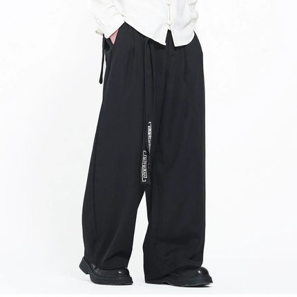 Pantaloni da uomo in stile giapponese con stampa Ukiyo-e, pantaloni comodi e alla moda, pantaloni larghi da uomo, pantaloni casual a gamba dritta da uomo