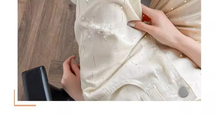 Jeans bianchi traspiranti a gamba larga da donna Pantaloni strappati per pantaloni estivi a vita alta con diamanti