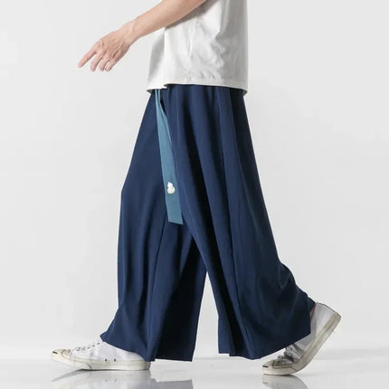 2023 Pantaloni da uomo a gamba larga Pantaloni da jogging in cotone Pantaloni larghi retrò Uomo Pantaloni di lino stile cinese Maschio Grande cavallo Nepal Abito Pantaloni solidi