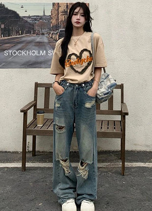 Jeans americani retrò traforati da donna a vita alta con cavallo dritto design sottile allentato High-street Vibe pantaloni trascinanti a gamba larga