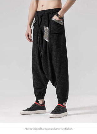 Pantaloni a gamba larga da uomo in cotone e lino casual oversize Harajuku pantaloni alla moda da uomo samurai giapponese retrò Ukiyo-e stampa pantaloni con cintura da uomo