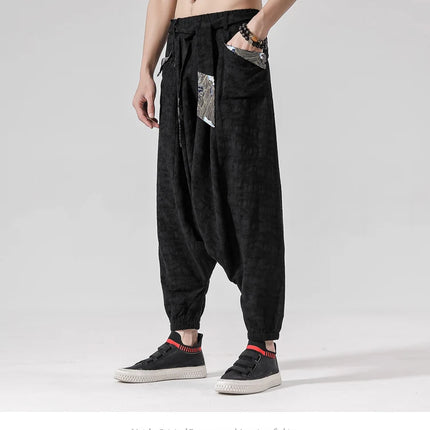 Pantaloni a gamba larga da uomo in cotone e lino casual oversize Harajuku pantaloni alla moda da uomo samurai giapponese retrò Ukiyo-e stampa pantaloni con cintura da uomo