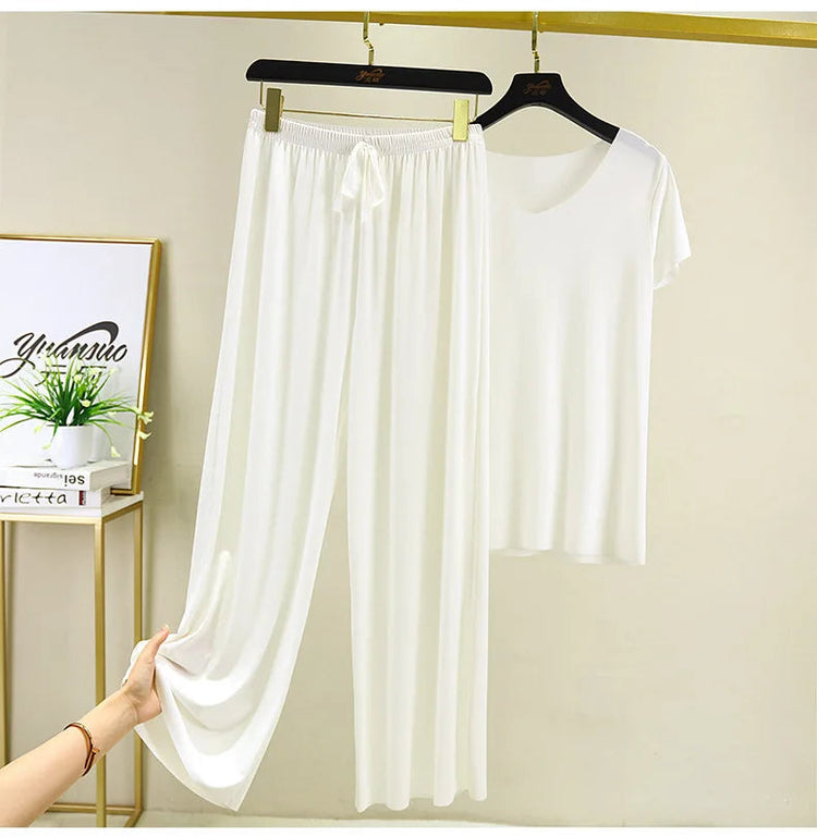 Completo due pezzi da donna: top e pantaloni. Set estivo due pezzi, abiti da donna per vacanze, nuova collezione 2026, pantaloni a gamba larga, eleganti e casual. platinumshop