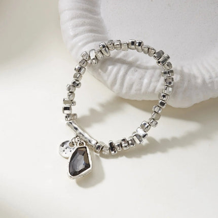 Set di bracciali con collana con pendente in cristallo grigio irregolare semplice barocco Set di gioielli con perline color argento estetico delicato per donna uomo platinumshop