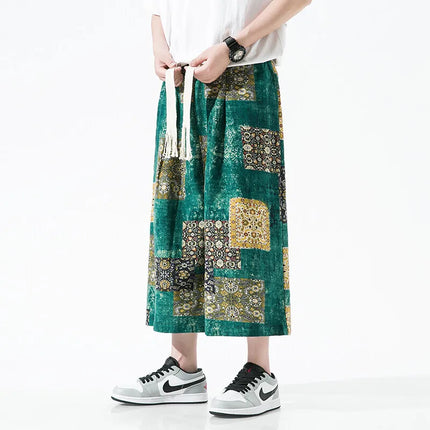 Pantaloncini da uomo estivi Stampa Pantaloni da spiaggia traspiranti a gamba larga Pantaloni larghi casual alla moda Vita elastica Comodi pantaloni al polpaccio da uomo