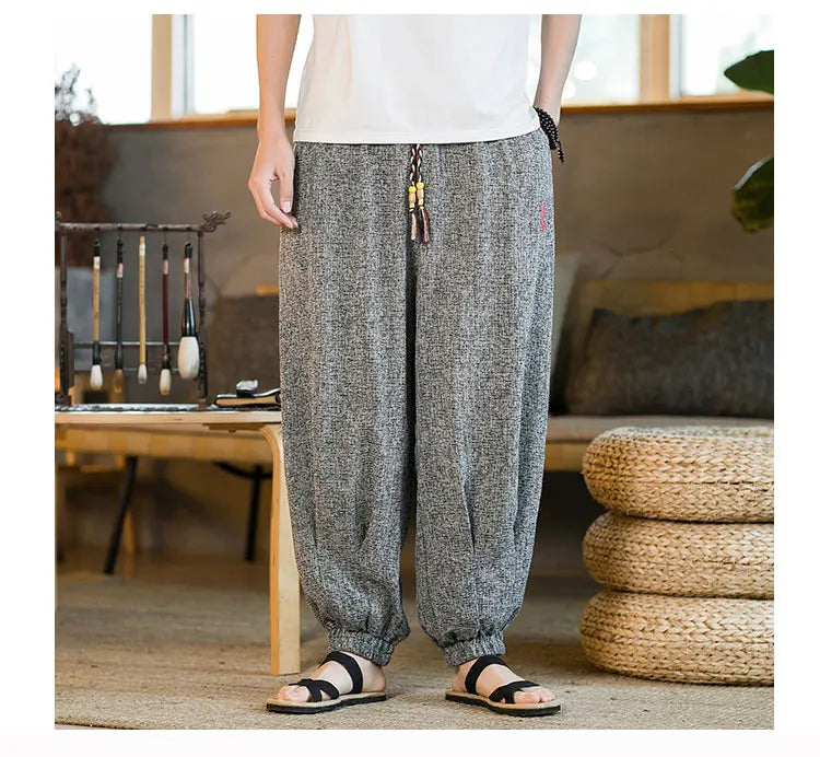 Pantaloni da jogging in seta di ghiaccio da uomo pantaloni casual stile Harajuku cinese da uomo pantaloni sportivi Harlem allentati ricamati streetwear 5XL