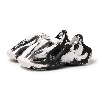 Pantoufles compensées camouflage unisexe Matériau souple EVA Technologie de moulage par injection Chaussures de plage décontractées pour hommes et femmes