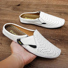 Nuove pantofole da uomo in vera pelle estate traspirante Casual muli mezze scarpe leggere per uomo mocassini da guida antiscivolo all'aperto uomo
