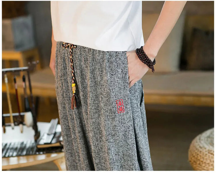 Pantaloni da jogging in seta di ghiaccio da uomo pantaloni casual stile Harajuku cinese da uomo pantaloni sportivi Harlem allentati ricamati streetwear 5XL