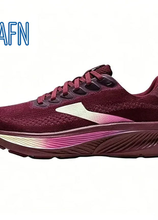 Scarpe da corsa professionali in tessuto jacquard ultra-traspirante, con suola ondulata ad alta reattività per allenamento maratona e corsa a lunga distanza intensiva.