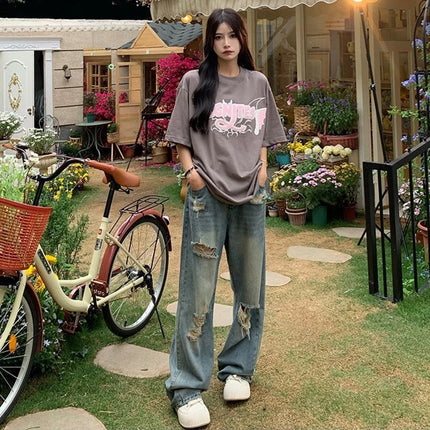 Jeans americani retrò traforati da donna a vita alta con cavallo dritto design sottile allentato High-street Vibe pantaloni trascinanti a gamba larga