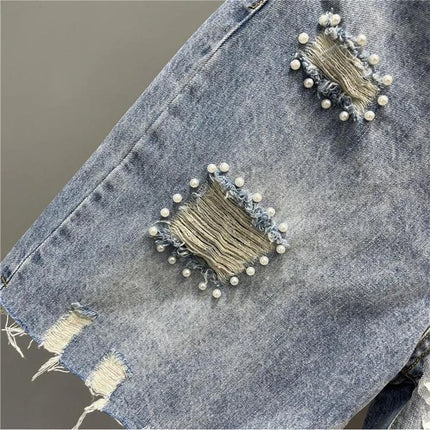 Pantaloncini di jeans con foro sfilacciato floreale con perline alla moda Pantaloncini casual estivi da donna a vita alta in tinta unita stile coreano
