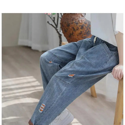 Jeans Strappati a Nove Punti da Donna, Nuovi Pantaloni Harem Casual Sottili con Vita Elastica, Lunghi alla Caviglia, in Denim, per l'Estate 2026