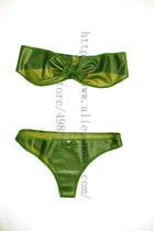 Sexy women's lingerie set including bra and briefts in transparent green color