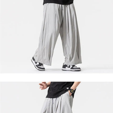 Pantaloni Harem Oversize da Uomo Leggeri Sottili Traspiranti Tinta Unita Stile Harajuku Gamba Larga Casual Moda Pantaloni Dritti Uomo 5XL