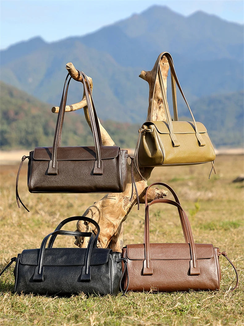 2025 nuova borsa a tracolla da donna in vera pelle borsa di lusso in pelle bovina di grande capacità borsa baguette rossa vino a striscia lunga femminile