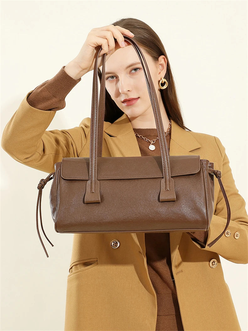 2025 nuova borsa a tracolla da donna in vera pelle borsa di lusso in pelle bovina di grande capacità borsa baguette rossa vino a striscia lunga femminile