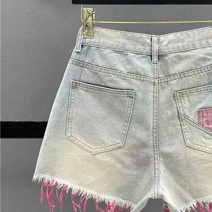 Pantaloncini di jeans con foro rosa stile coreano Donna Estate Nuova vita alta Bordo grezzo A-line Pantaloncini per ragazze calde Pantaloni caldi sottili di nicchia di moda