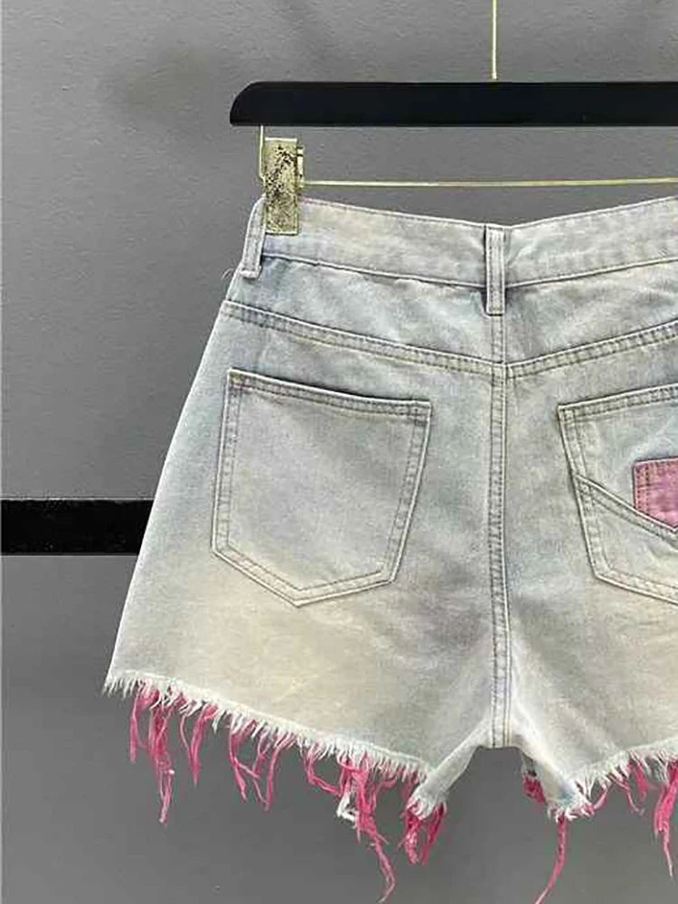 Pantaloncini di jeans con foro rosa stile coreano Donna Estate Nuova vita alta Bordo grezzo A-line Pantaloncini per ragazze calde Pantaloni caldi sottili di nicchia di moda