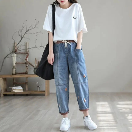 Jeans Strappati a Nove Punti da Donna, Nuovi Pantaloni Harem Casual Sottili con Vita Elastica, Lunghi alla Caviglia, in Denim, per l'Estate 2026