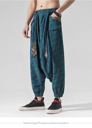 Pantaloni a gamba larga da uomo in cotone e lino casual oversize Harajuku pantaloni alla moda da uomo samurai giapponese retrò Ukiyo-e stampa pantaloni con cintura da uomo