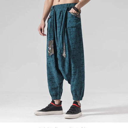 Pantaloni a gamba larga da uomo in cotone e lino casual oversize Harajuku pantaloni alla moda da uomo samurai giapponese retrò Ukiyo-e stampa pantaloni con cintura da uomo