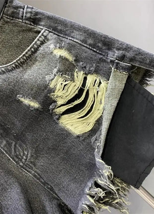 Nuovo stile di pantaloncini di jeans strappati con tasche lavate sfilacciate e piedi larghi
