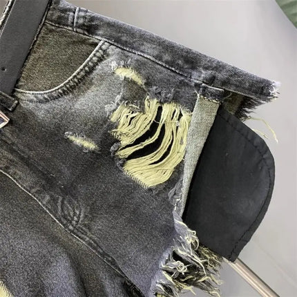 New style ripped denim shorts with frayed washed pockets and wide legs