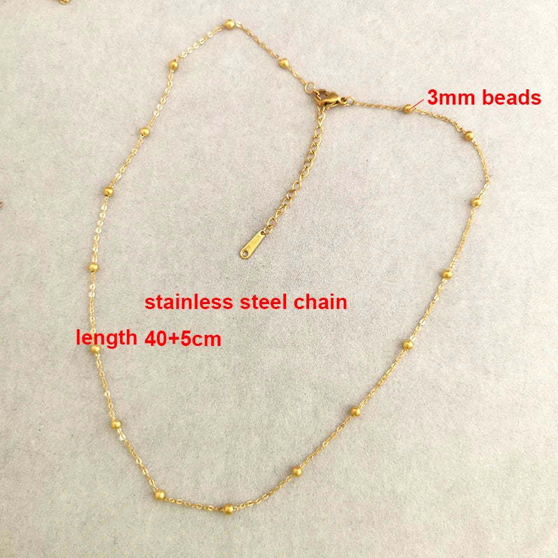 QMHJE Collana con ciondolo Vergine Maria Collana da donna con croce Girocollo Perline Catena in acciaio inossidabile Colore oro Boho Bianco Nero Rosa