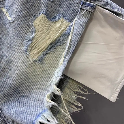 New style ripped denim shorts with frayed washed pockets and wide legs