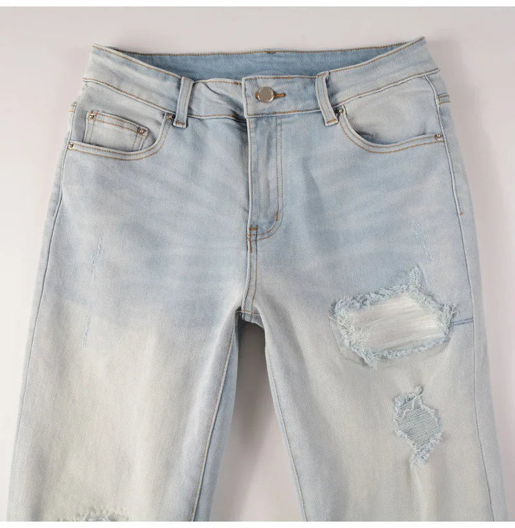 Men Pale Light Blue Biker Jeans Cracked Pleated Patch Patchwork Stretch Denim Pants Streetwear Holes Ripped Skinny Trousers PlatiNum
