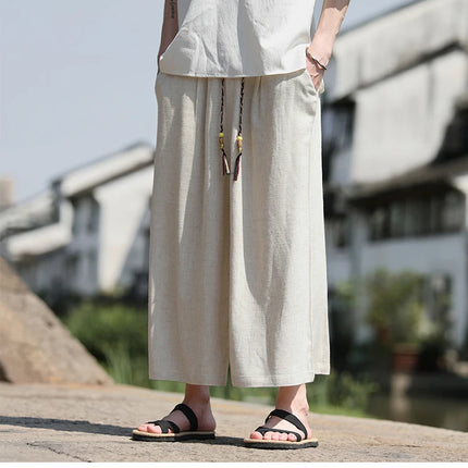Pantaloncini larghi da uomo Pantaloni casual traspiranti estivi Gamba larga in cotone di lino Taglie forti 5XL Pantaloni Harajuku comodi da esterno da uomo