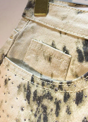 2025 Abiti estivi, Nuovi pantaloncini di jeans con bordo ruvido indossato a vita alta con perforazio