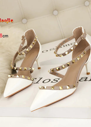 Scarpe tacco alto da donna estive in Europa e America Moda punta a punta bocca superficiale rivetto scava fuori sandali a spillo da discoteca platinumshop