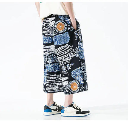 Pantaloncini da uomo estivi Stampa Pantaloni da spiaggia traspiranti a gamba larga Pantaloni larghi casual alla moda Vita elastica Comodi pantaloni al polpaccio da uomo