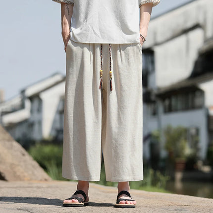 Pantaloncini larghi da uomo Pantaloni casual traspiranti estivi Gamba larga in cotone di lino Taglie forti 5XL Pantaloni Harajuku comodi da esterno da uomo