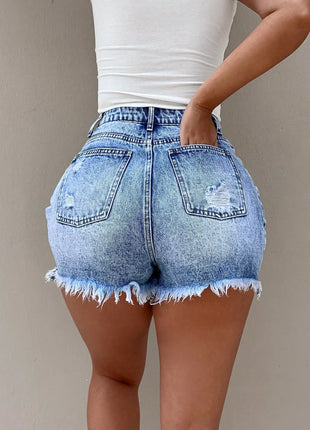 Pantaloncini in denim dal design invecchiato a vita alta alla moda e versatili per l'estate 205. Nuovo stile, pantaloncini larghi e alla moda.