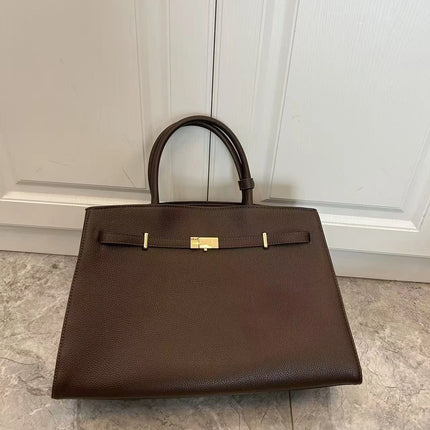 Borsa a mano di lusso in pelle martellata con chiusura in metallo, manico rigido, borsa professionale per affari e cerimonie